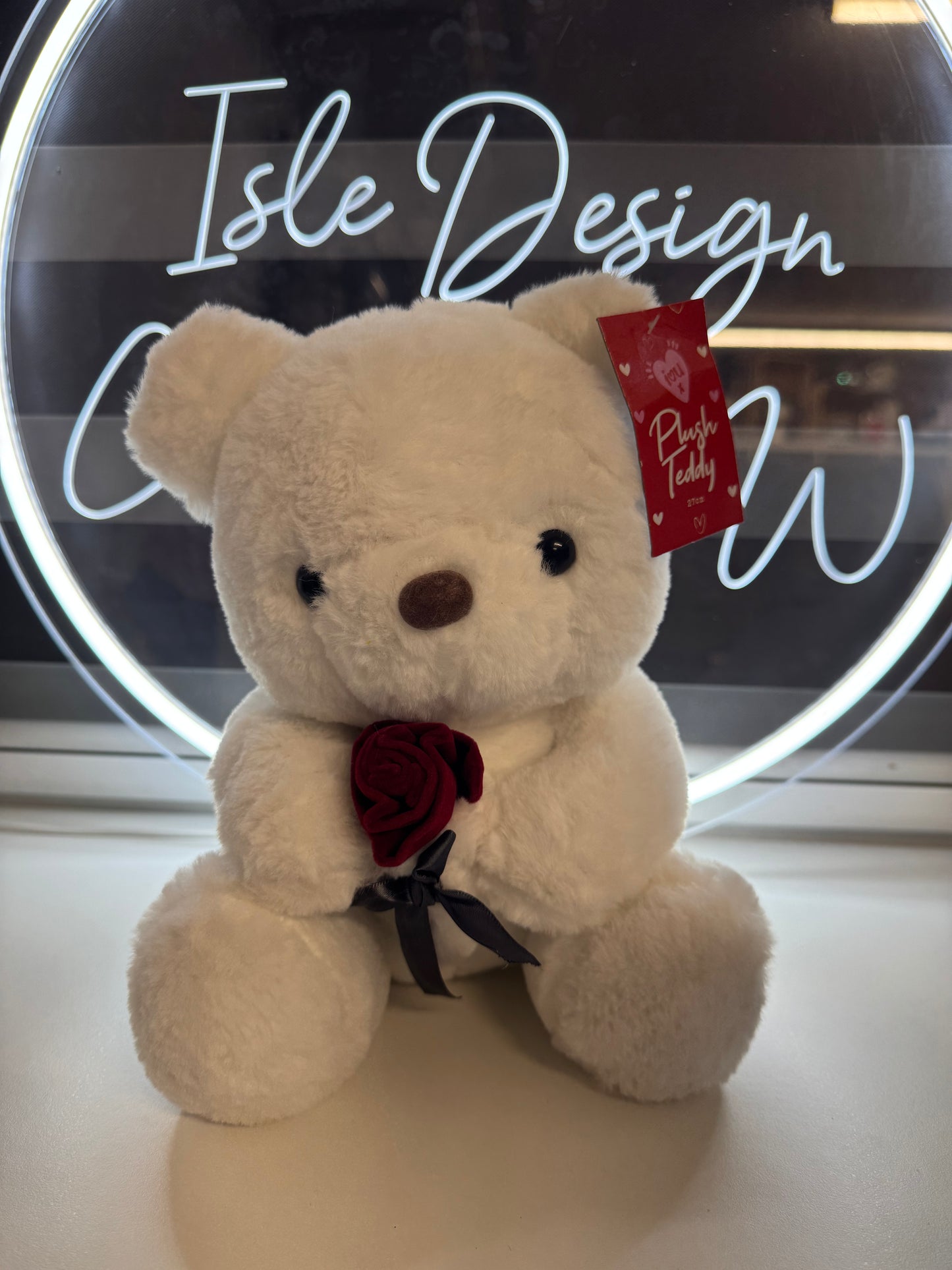 Rose Holding Teddy Bear